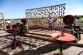 A Closer Look At The Wine Release Party Concept With Red Roses And A Grape Backdrop At Our Venue Monterra At Westworld De Wineyard Wedding Photography Event