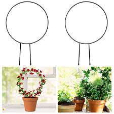 Trellises, arbors, obelisks, poles, and more add structure to your garden and a pretty perch for climbers. 2 Pack Black Iron Garden Trellis For Climbing Plants 13 Rust Free Vine Plant Metal Support