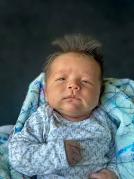 Can someone edit my son's photo in Native American attire?