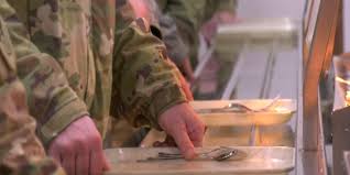 Serving soldiers and service members a hot Thanksgiving meal at Fort  Wainwright