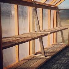 These shelves are great for greenhouses or garages where you don't need a place to store items, but you don't want to spend a lot of money on the project. Greenhouse Shelving Google Search Diy Garden Furniture Greenhouse Shelves Indoor Greenhouse