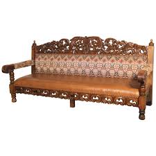 Barley twist, etc.) but never a bench like this. Hacienda Style Spanish Or Mexican Carved Pine And Upholstered Vintage Bench Sofa At 1stdibs
