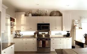 Decorate Above Kitchen Cabinets Or Not Cabinet Decorating Ideas Decorating Above Kitchen Cabinets Kitchen Cabinets Decor Above Kitchen Cabinets