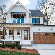 White Wood With Black Modern Farmhouse Exterior House Exterior Farmhouse Exterior