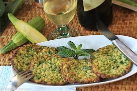 Crispy, salty zucchini fritters make for an excellent appetizer or side dish. Zucchini Fritters Taste Of Beirut