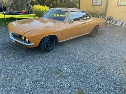 Image result for Sierra Tan 1965 Corvair