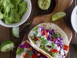 Step 1 stir sour cream, mayonnaise, lime juice, cilantro, seafood seasoning, and ancho chile pepper together in a bowl. 10 Best Fish Taco Dressing Recipes Yummly