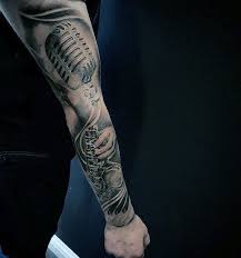 You can also get this design and decorate it with some other symbols, such as flowers. Amazing Microphone Guitar Mens Full Arm Music Sleeve Tattoo Designs Music Tattoo Sleeves Tattoo Sleeve Men Full Sleeve Tattoos