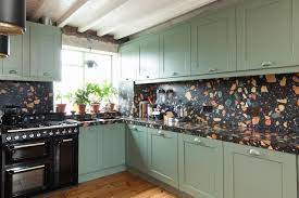Open shelving against a reclaimed brick backsplash is brightened up with recessed lighting. Trend Alert What Is Terrazzo And How To Use It In Your Home Hgtv