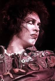 Tim Curry, starring as Mad Scientist Frank N Furter who enters singing 'I'm  Just A Sweet Transvestite From Transexual Transylvania' is a major talent  discovery. How many male performers could go through
