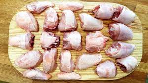 Pop both sides out of their socket and put the chicken breast side down and cut along the meat that you can see through the skin. How To Portion A Whole Chicken Into 22 Pieces Srp Choicken Youtube
