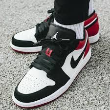 The swoosh, eyestay and toe box are finished in black nubuck, while the 'wings' logo has been debossed tonally on the collar. Jordan One Low Black Toe Buy Clothes Shoes Online
