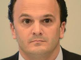 Faced with lawsuit, Cockerham resigns from Lafayette board