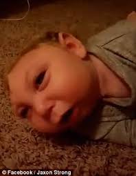 Cute video shows Jaxon Buell with half a skull says hello to parents