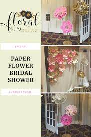 Treat each and every one of your guests to a beautiful bouquet of flowers upon opening the invitation to your bridal shower set upon a pretty blue backdrop, the letters are delicately entwined with climbing green vines and bright florals. Chicago Paper Flower Bridal Shower Floral By Emily Jane
