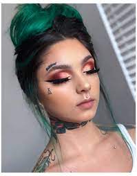 He has a knife tattoo on his forehead. 101 Amazing Face Tattoo Designs With Ideas With Meanings Body Art Guru
