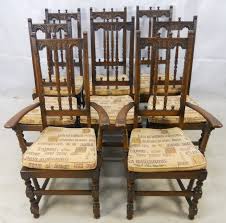 Spanning roughly two centuries from the 1600s to the 1800s, this historical period was a time of radical change. Set Of Eight Ercol High Back Dark Elm Dining Chairs From Old Colonial Range