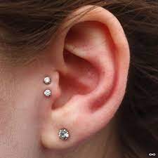 double tragus piercings by andru earings piercings ear peircings tiny stud earrings