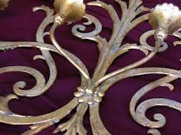 Like the wrought iron gates of the historic french quarter in new orleans, our oversize candle sconce evokes charm and romance. Large Italian Gilt Wrought Iron Six Light Wall Candle Sconce At 1stdibs