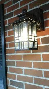 Enjoy free shipping on most stuff, even big stuff. Hampton Bay Mission Style Black With Bronze Highlight Outdoor Wall Lantern With Built In Electrical Outlet Gfci 30264 The Home Depot Wall Lantern Outdoor Wall Lantern Outdoor Wall Lighting