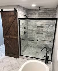 With continuous flooring and white wall tiles throughout the room will freshen the look and make the bathroom appear polished and clean. Image 0 Remodeling Urbanbathroomdesign Rustic Bathroom Remodel Bathroom Remodel Master Bathroom Remodel Designs