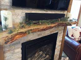 Check out a quick peek at the new diy fireplace surround we built just in time for the holidays. Live Edge Mantel Wood Mantle Fireplace Living Room Decor Fireplace Wood Fireplace Mantel