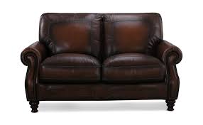Leather loveseats work for two people sitting or one person lying down. Charlie Leather Loveseat By Thomas Cole Hom Furniture