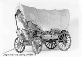 A Covered Wagon Like The One Pioneers Used To Cross The Oregon Trail Horse Drawn Wagon Covered Wagon Horse Wagon