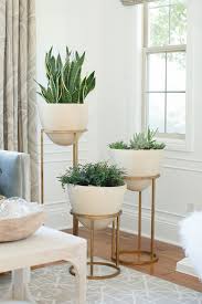 10 Tips For How To Decorate Like A Designer The Everygirl Living Room Corner Corner Decor Living Decor