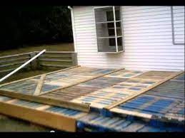 Measure the pallets and deck site carefully to ensure that your new deck fits the space. Decking Made From Pallets Youtube