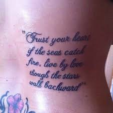 The phrase, art, music, & love, is pictured on the wearer's wrist in this black tattoo. 25 Best Tattoo Quotes With Images Styles At Life