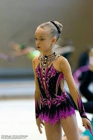 pin by nicole on hudozhestvenaya gimnastika figure skating dresses skating dresses gymnastics outfits