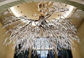 Sirshasana By Artist Donald Lipski This Sculptural Chandelier Was Created In The Shape Of A Golden Rooted O Chandelier Makeover Chandelier Beautiful Lighting
