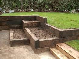 Timber Frame Retaining Wall Steps Terraced Planting Beds Sloped Garden Sleepers In Garden Garden Design