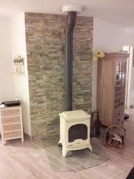 Poele A Bois Seville Emaille Ivoire Parement Pierres Plaque De Verre Au Sol Perigny Invicta Shop La Rochelle Poele A Bois Briquette De Parement Bois