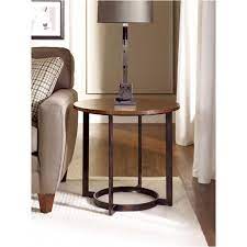 That unique corner of the world served as inspiration for the striking creation that we call nueva. T2063235 00 Hammary Furniture Nueva Living Room Round End Table