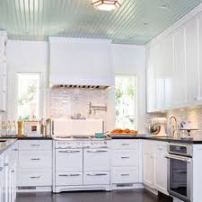 For a bolder look, paint your beadboard kitchen cabinets a bright, vivid shade. White Beadboard Kitchen Cabinets Houzz