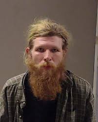 PHOTOS: 23 people charged after attack at proposed training facility