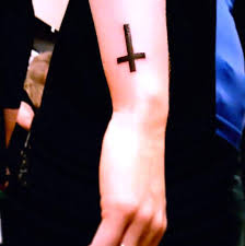 3d metallic mens music note upper arm tattoo with microphone. Cross On Outer Wrist Tattoo Idea