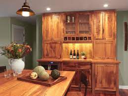 It is common for the kitchen island to be different color from the surrounding cabinets and for the kitchen to have a custom, built in hutch made by the cabinetmaker that is a different color than the rest of the kitchen cabinets. Custom Built Hutch Cabinet Fine Homebuilding