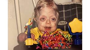 Nurse takes graduation photos for hospice survivor