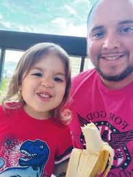 Twin granddaughters' graduation with purse-free Scottevest shirt