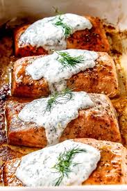 Today, all we're doing is rubbing the fillets with a little oil and sprinkling them with salt and pepper. Side View Of Healthy Oven Baked Salmon Fillets In A Row Topped With Dill Sauce Salmon Fillet Recipes Salmon Recipes Baked Healthy Baked Salmon Recipes
