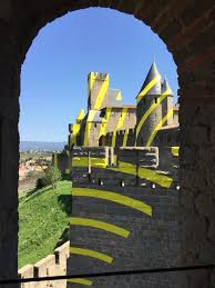 The Walls Of A Fortress City In Southern France Ripple With Bright Yellow Concentric Circles Colos Castle Painting Funny Optical Illusions Carcassonne Castle