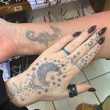 After you've scraped most of the paste, then you can take a cool, wet cloth and rub off the rest. Henna Tattoos Or Jagua Tattoos Which Temporary Tattoo Is Better