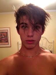 Happy looking young boy taking shower in the bathroom. Pin On B O Y S