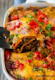This Beef Enchilada Casserole Is Layers Of Ground Beef Beans Tortillas And Cheese All Smothered In Enchil Enchilada Casserole Beef Mexican Food Recipes Food