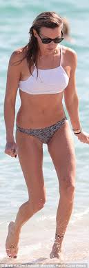 She is known for her role as felicity smoak on the cw series arrow, her first television credit. Arrow S Katie Cassidy And Emily Bett Rickards Flaunt Their Bikini Bodies In Miami Daily Mail Online