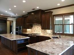 Colonial White Granite With Bordeaux Finish Cherry Cabinets And Mixed Brown Mosaic Backsplas Kitchen Remodel Small Kitchen Remodel Layout Dark Kitchen Cabinets