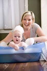 Mother Giving 7 Month Old Baby A Bath Stock Photo Picture And Royalty Free Image Image 6610691